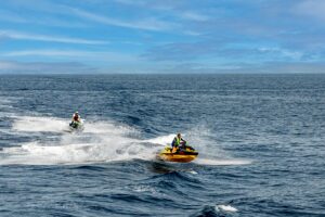 Exciting jet ski race across the vibrant Mediterranean Sea, capturing speed and adventure.